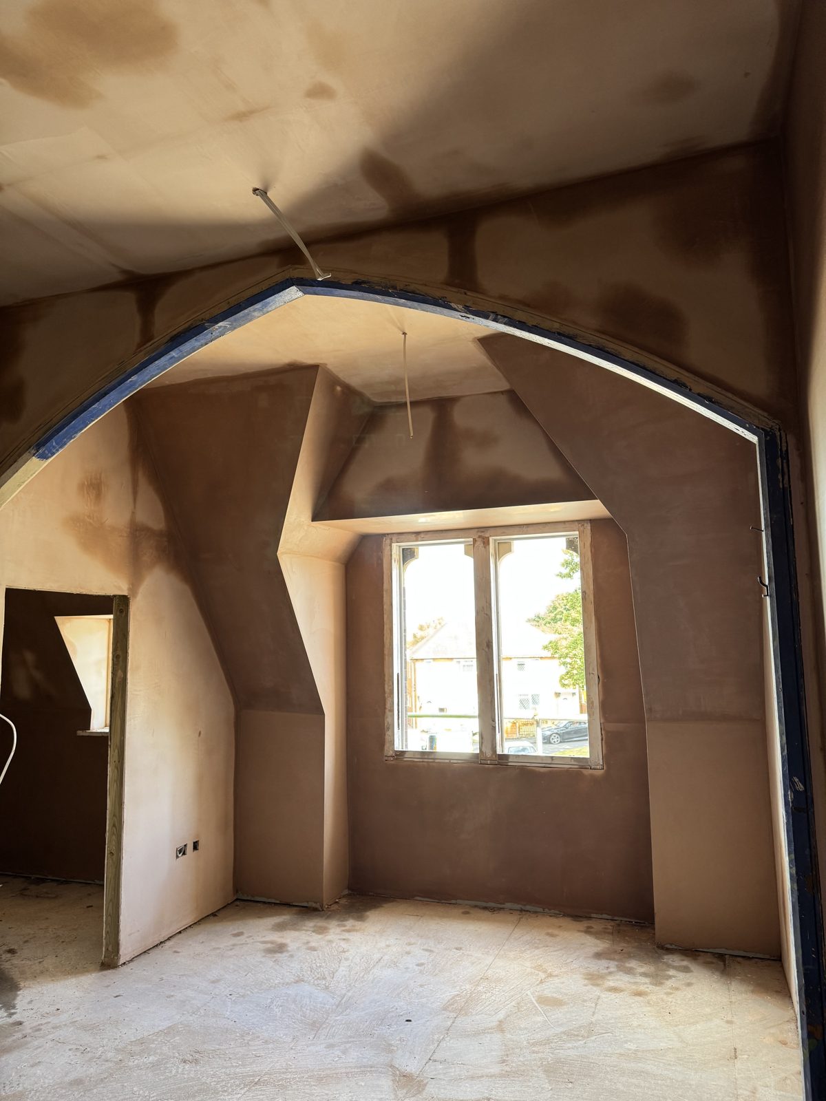 Plastered room with a window