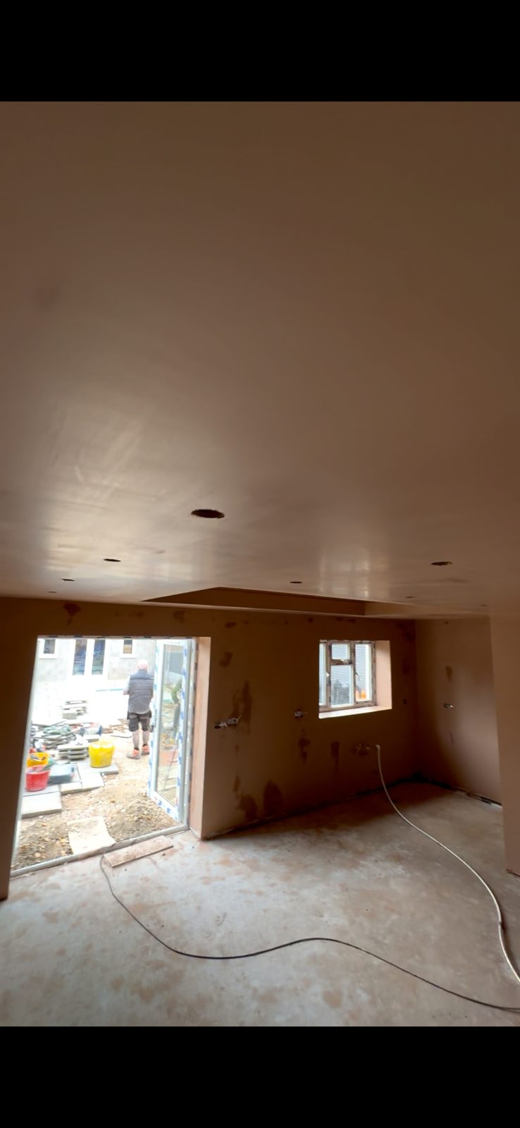 Plastered room with door openings