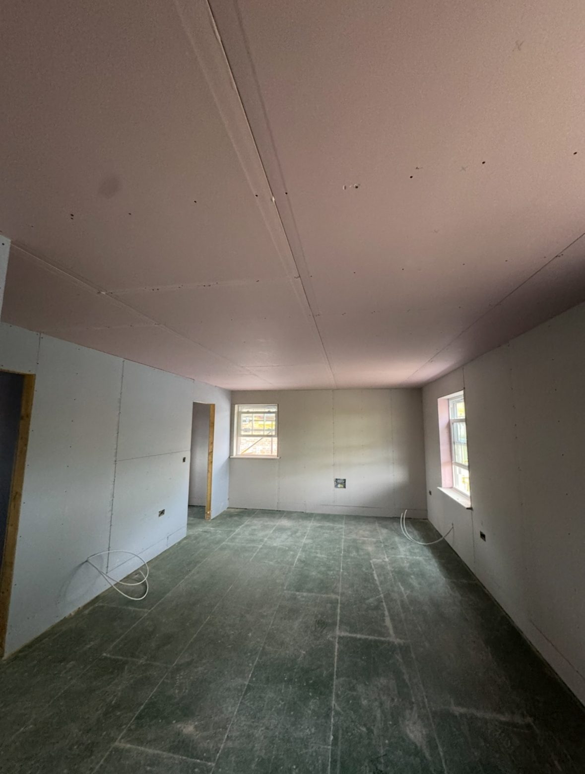 Plasterboard walls and ceiling in a new-build room